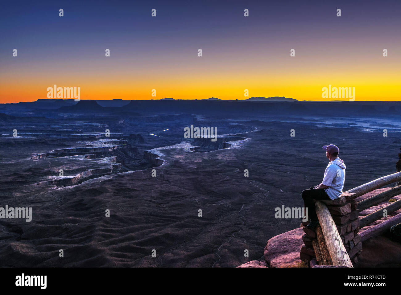 Tourist at the Green River Overlook in Canyonlands National Park Stock Photo