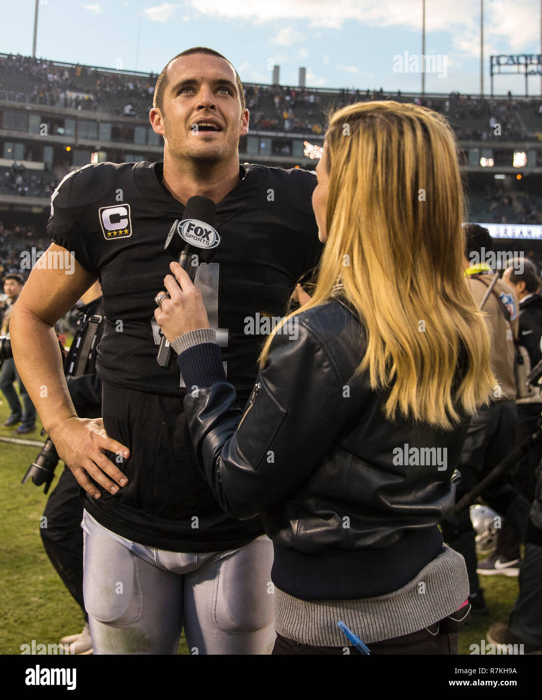 Dec 09 2018 Oakland U.S.A CA Oakland Raiders quarterback Derek Carr (4) with fox sports after the NFL Football game between Pittsburgh Steelers and the Oakland Raiders 24-21 win at O.co Coliseum Stadium Oakland Calif. Thurman James/CSM Stock Photo
