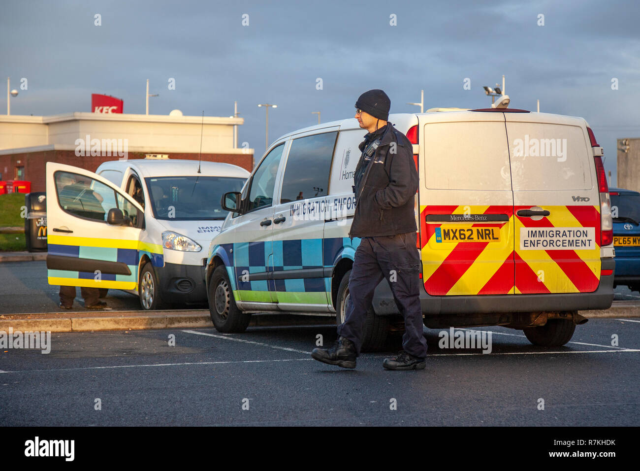 Home Office Immigration enforcement officers operating in Southport, Merseyside. UK. Dec, 2018.  A team of several officers in two vehicles spent one and half hours in McDonald's during a planned operation to target immigration offences in the town centre. Stock Photo