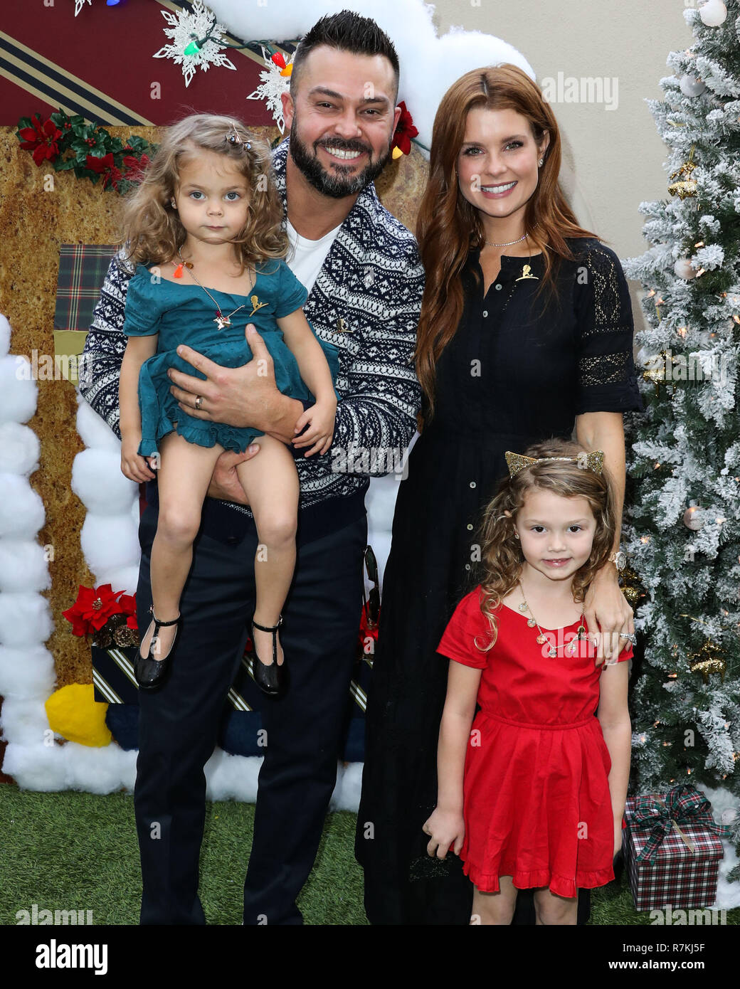 Los Angeles, USA. 9th Dec 2018. Sailor Stevie Swisher, Nick Swisher, Emerson Jay Swisher and JoAnna Garcia Swisher arrive at the Brooks Brothers Annual Holiday Celebration In Los Angeles To Benefit St. Jude 2018 held at the Beverly Wilshire Four Seasons Hotel on December 9, 2018 in Beverly Hills, Los Angeles, California, United States. (Photo by Xavier Collin/Image Press Agency) Credit: Image Press Agency/Alamy Live News Stock Photo