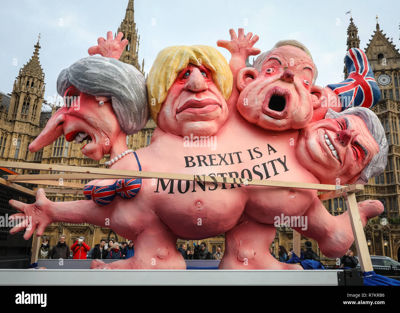 Westminster London, UK, 8th Dec 2018. A 'Breit is a Monstrosity political cartoon sculpture,is transported around Westminster on a van. Activists from both the Remain or 'Anti-Brexit' side, as well as campaigners for 'Leave means Leave ' ,who want to leave the EU, are protesting outside the Houses of Parliament in Westminster with placards, banners and chants. Both sides appear to vocally reject the current Brexit 'deal' offered. Credit: Imageplotter News and Sports/Alamy Live News Stock Photo