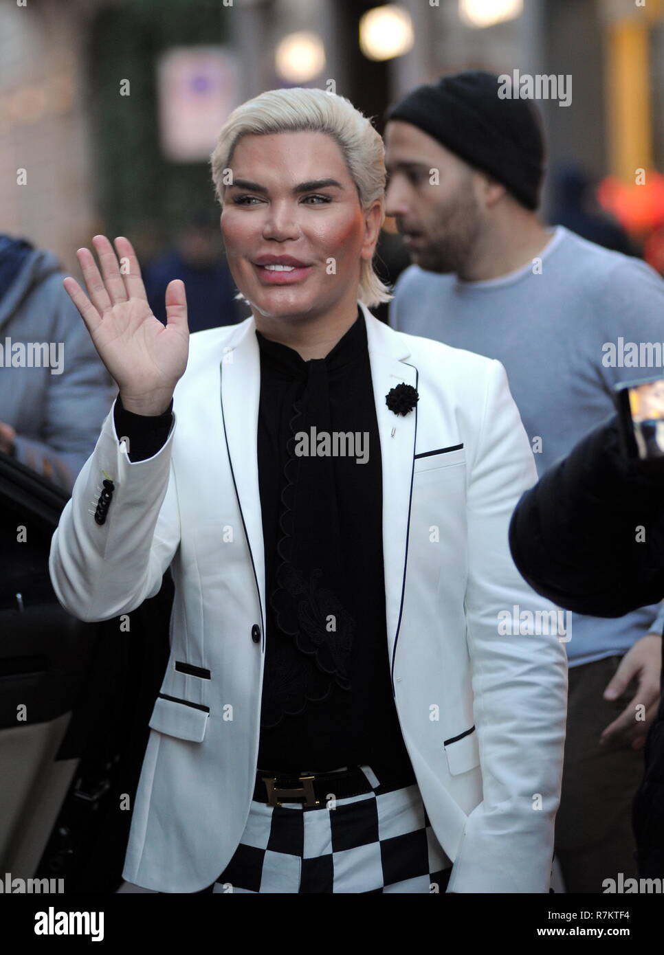 Milan, Italy. 10th December 2018. Rodrigo Alves shopping center Rodrigo Alves, the "human Ken", surprised walking through the streets of downtown while doing some shopping. Here he is while he visits the "GUCCI" boutique in via Montenapoleone, then a car arrives that will take him back to the hotel. Credit: Independent Photo Agency Srl/Alamy Live News Stock Photo