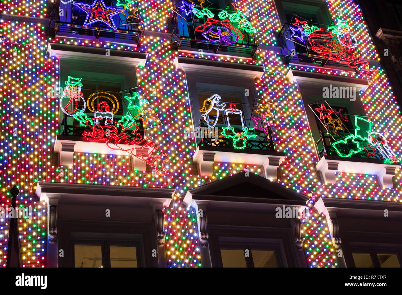 London, UK. 10th December 2018. A view of the exterior of the  new flagship store by fashion designer Stella McCartney in Old Bond Street  is lit  up in Christmas decorations Credit: amer ghazzal/Alamy Live News Stock Photo