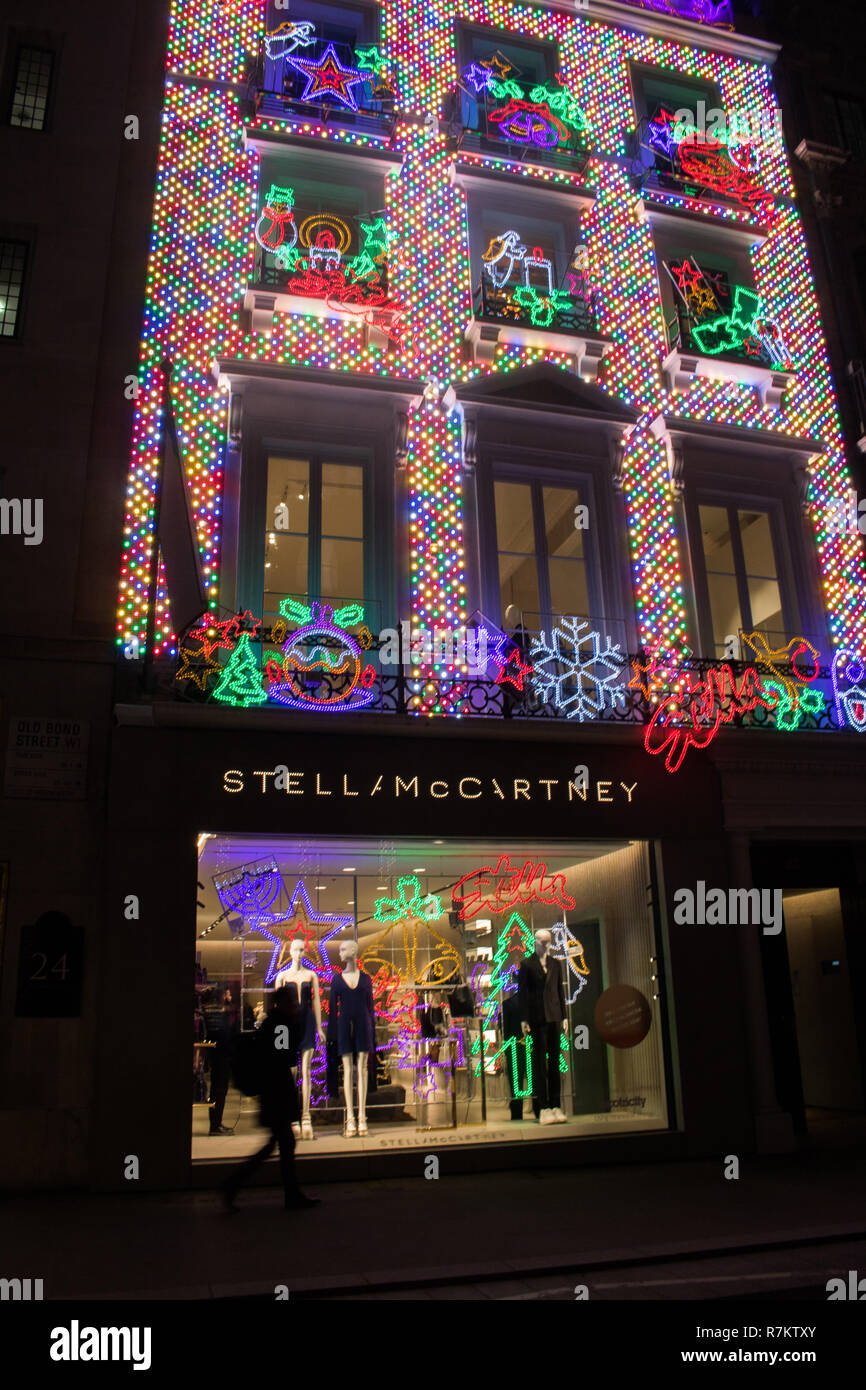 London, UK. 10th December 2018. A view of the exterior of the  new flagship store by fashion designer Stella McCartney in Old Bond Street  is lit  up in Christmas decorations Credit: amer ghazzal/Alamy Live News Stock Photo