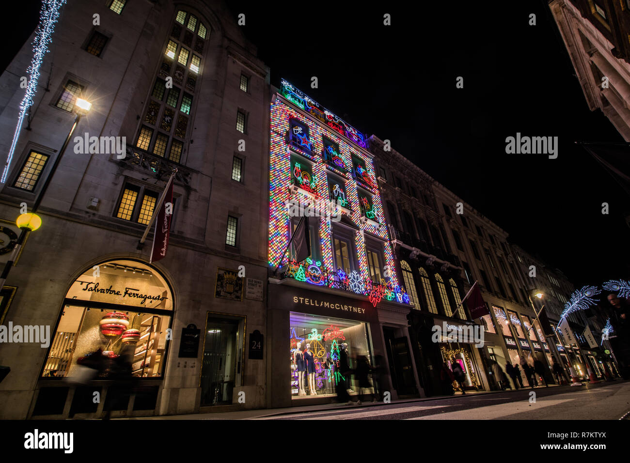 London, UK. 10th December 2018. A view of the exterior of the  new flagship store by fashion designer Stella McCartney in Old Bond Street  is lit  up in Christmas decorations Credit: amer ghazzal/Alamy Live News Stock Photo