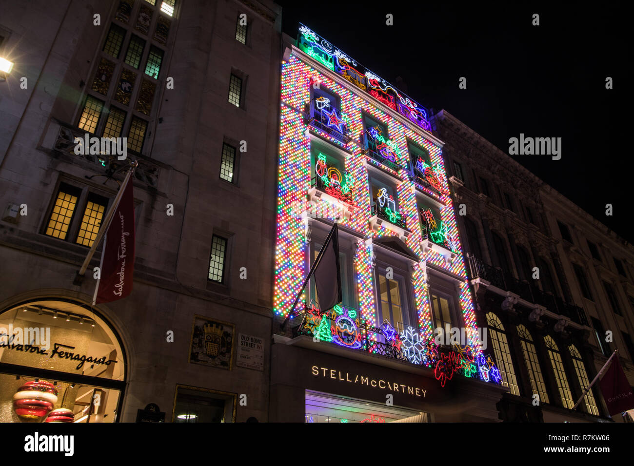 London, UK. 10th December 2018. A view of the exterior of the  new flagship store by fashion designer Stella McCartney in Old Bond Street  is lit  up in Christmas decorations Credit: amer ghazzal/Alamy Live News Stock Photo