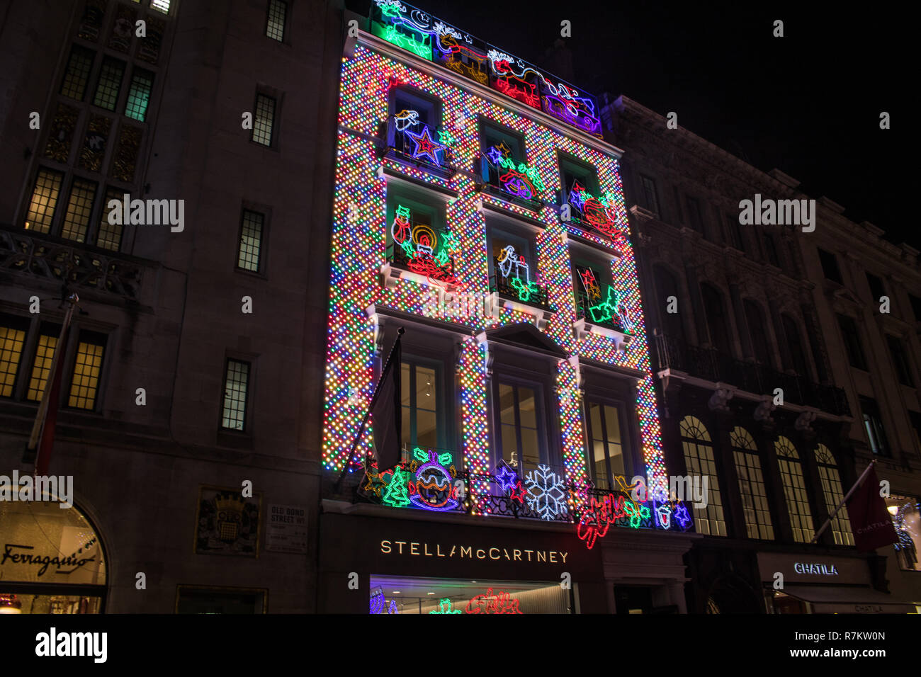 London, UK. 10th December 2018. A view of the exterior of the  new flagship store by fashion designer Stella McCartney in Old Bond Street  is lit  up in Christmas decorations Credit: amer ghazzal/Alamy Live News Stock Photo