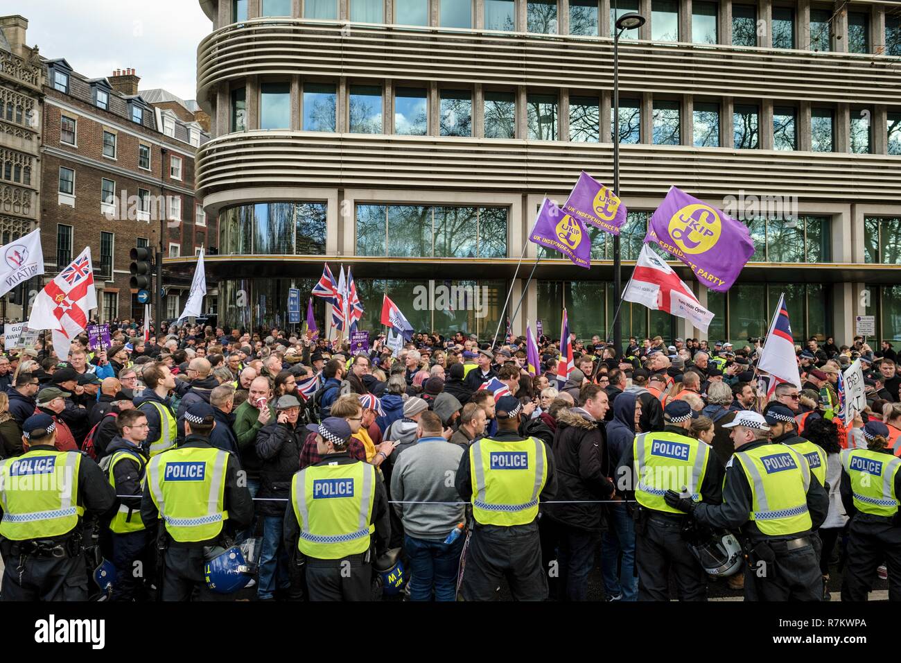 London, UK. 9th Dec, 2018. Protesters seen waving the UKIP flag during the no betrayal march.Thousands march from the Dorchester Hotel to Whitehall in central London to demand that there is no betrayal over Britain's exit from the European Union. Credit: Lewis Inman/SOPA Images/ZUMA Wire/Alamy Live News Stock Photo