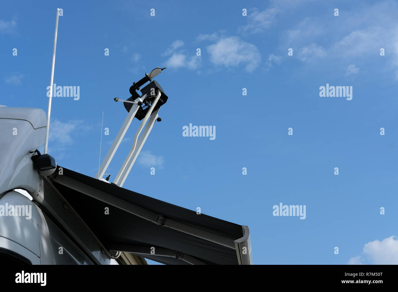 satellite tv car van with mobile antenna transmitting news event for