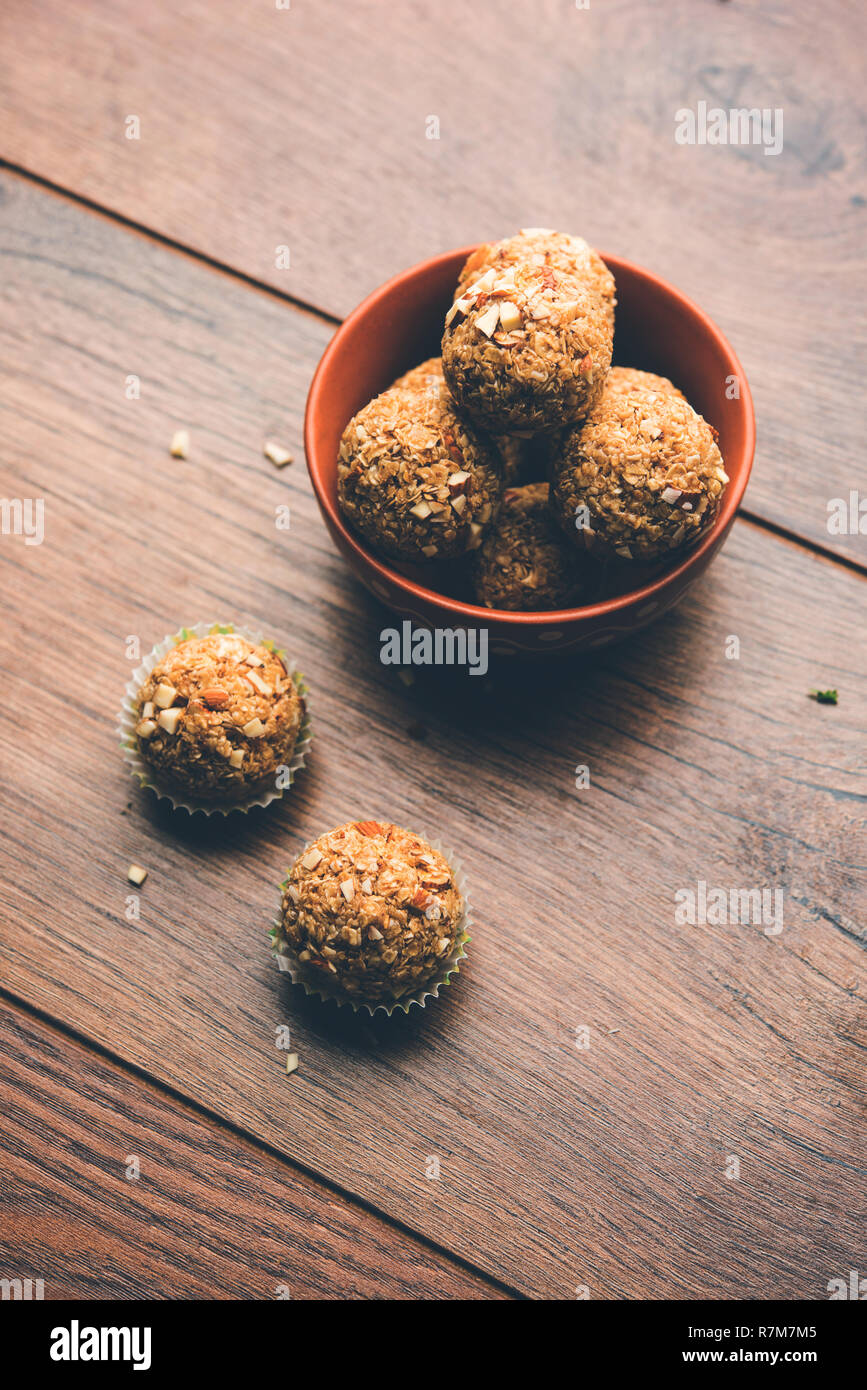 Oats laddu or Ladoo also known as Protein Energy balls. served in a plate or bowl. selective