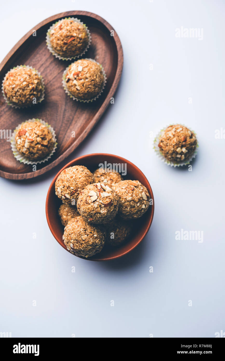 Oats laddu or Ladoo also known as Protein Energy balls. served in a plate or bowl. selective