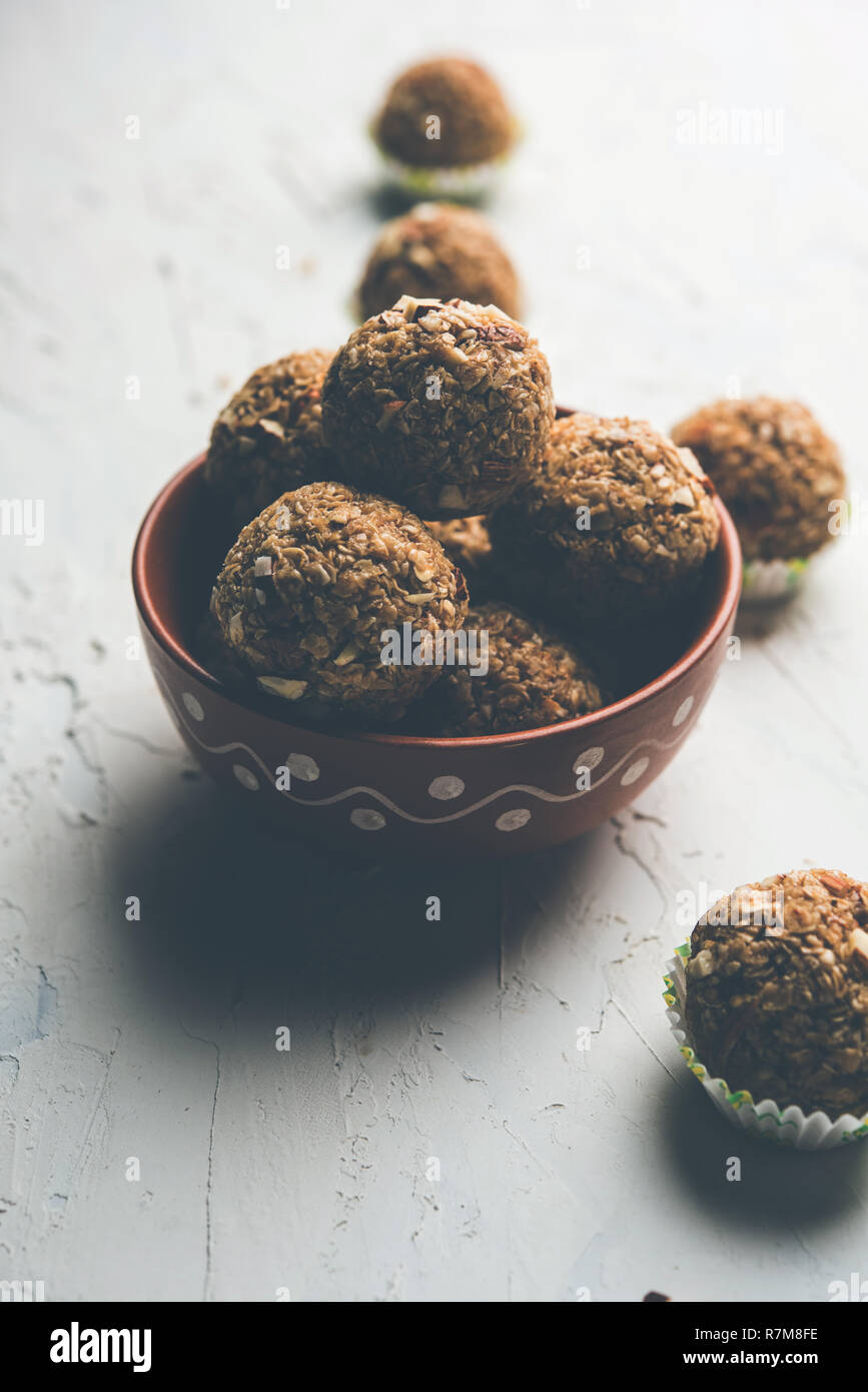 Oats laddu or Ladoo also known as Protein Energy balls. served in a plate or bowl. selective