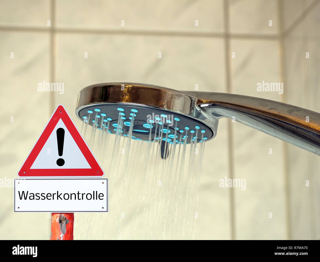 Warning triangle water control Stock Photo