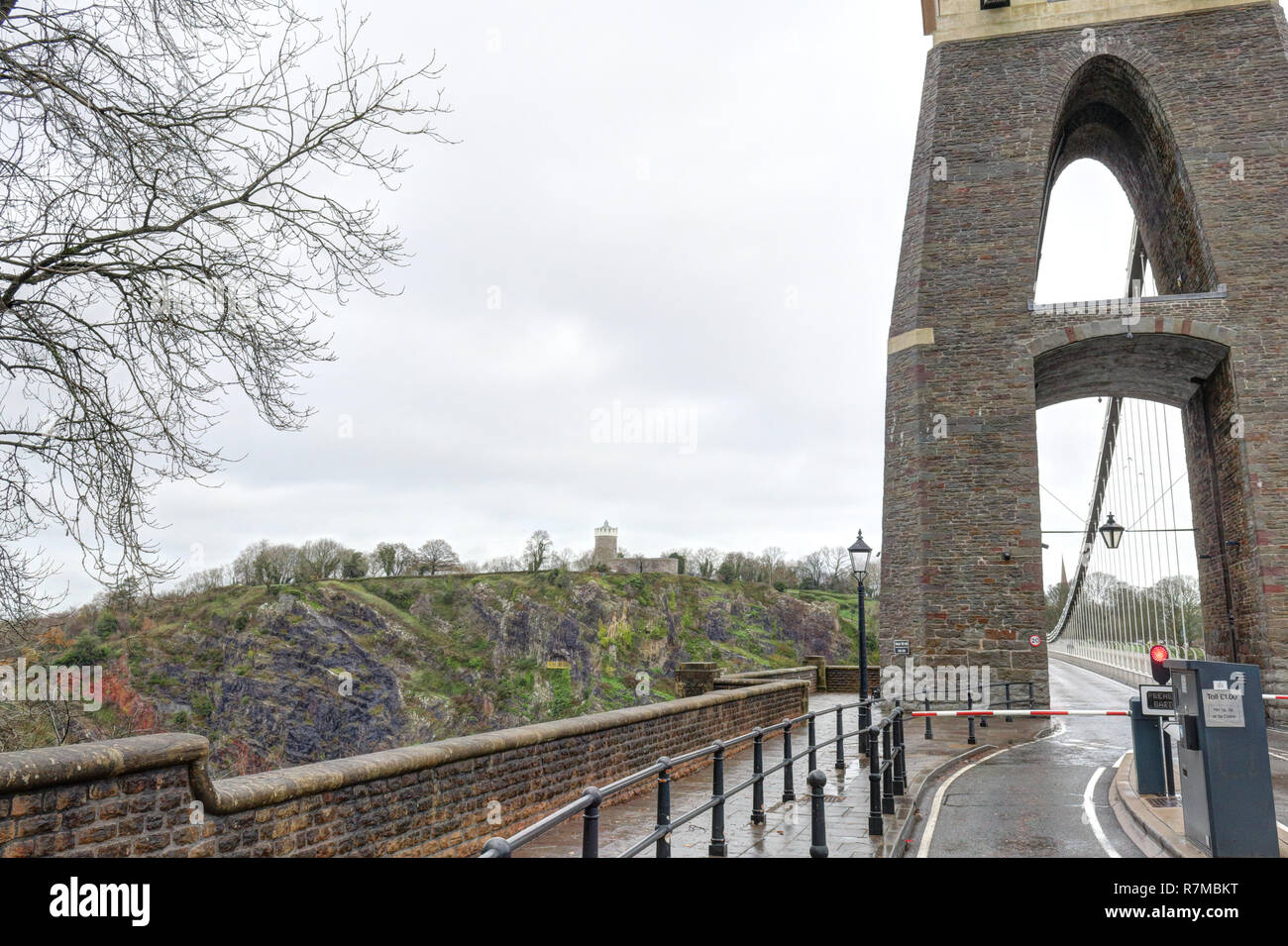 A detail of the tower at the entrance of the Clifton suspension bridge in a cloudy winter day in Bristol, United Kingdom Stock Photo