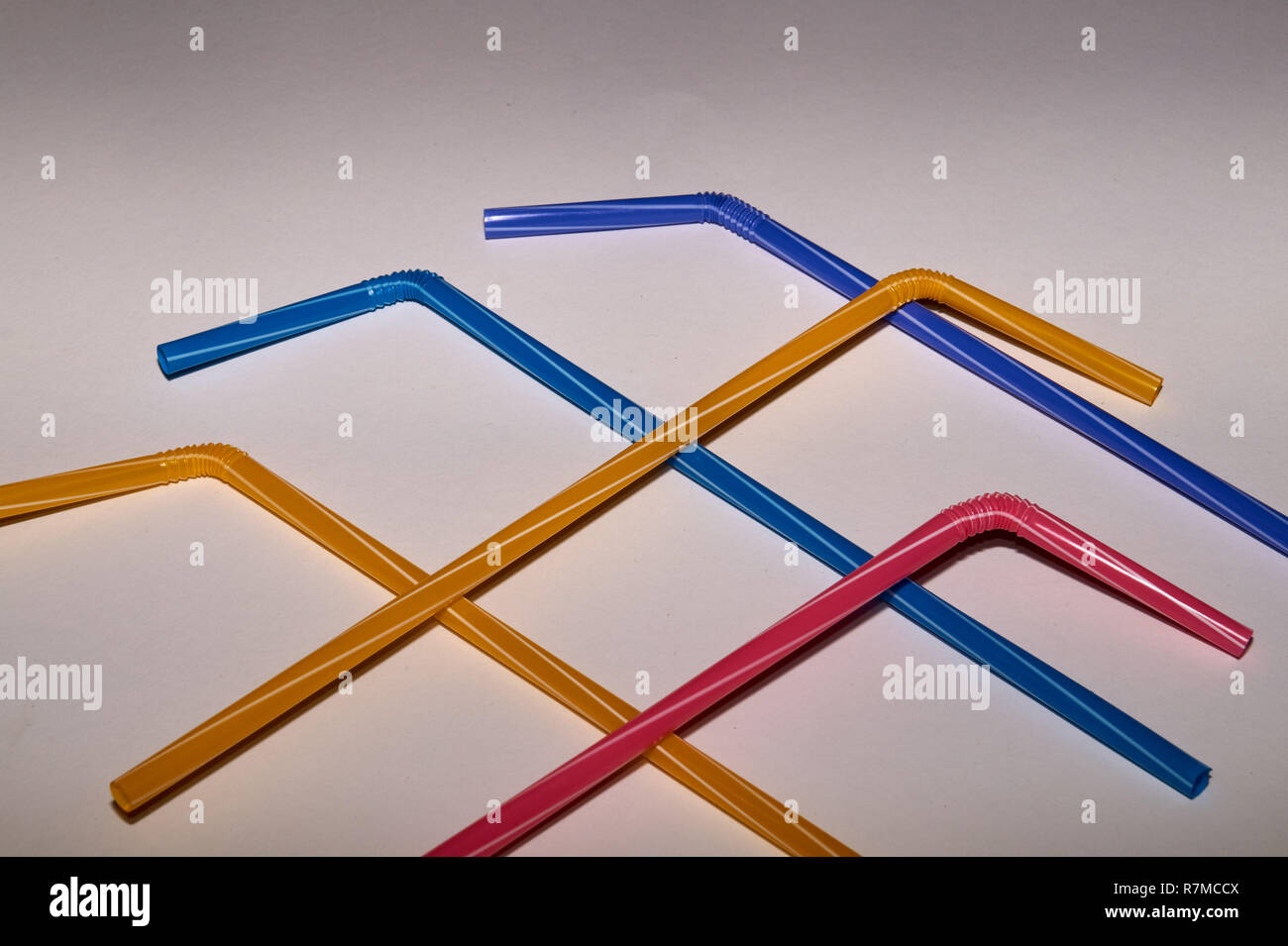 Stop using Plastic drinking straws, straws in different colors Stock Photo
