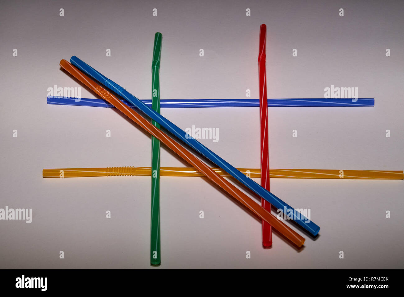 Stop using Plastic drinking straws, straws in different colors Stock Photo
