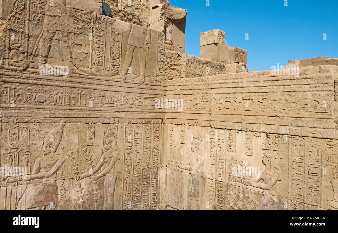 Hieroglypic carvings on wall at the ancient egyptian temple of Kom Ombo ...