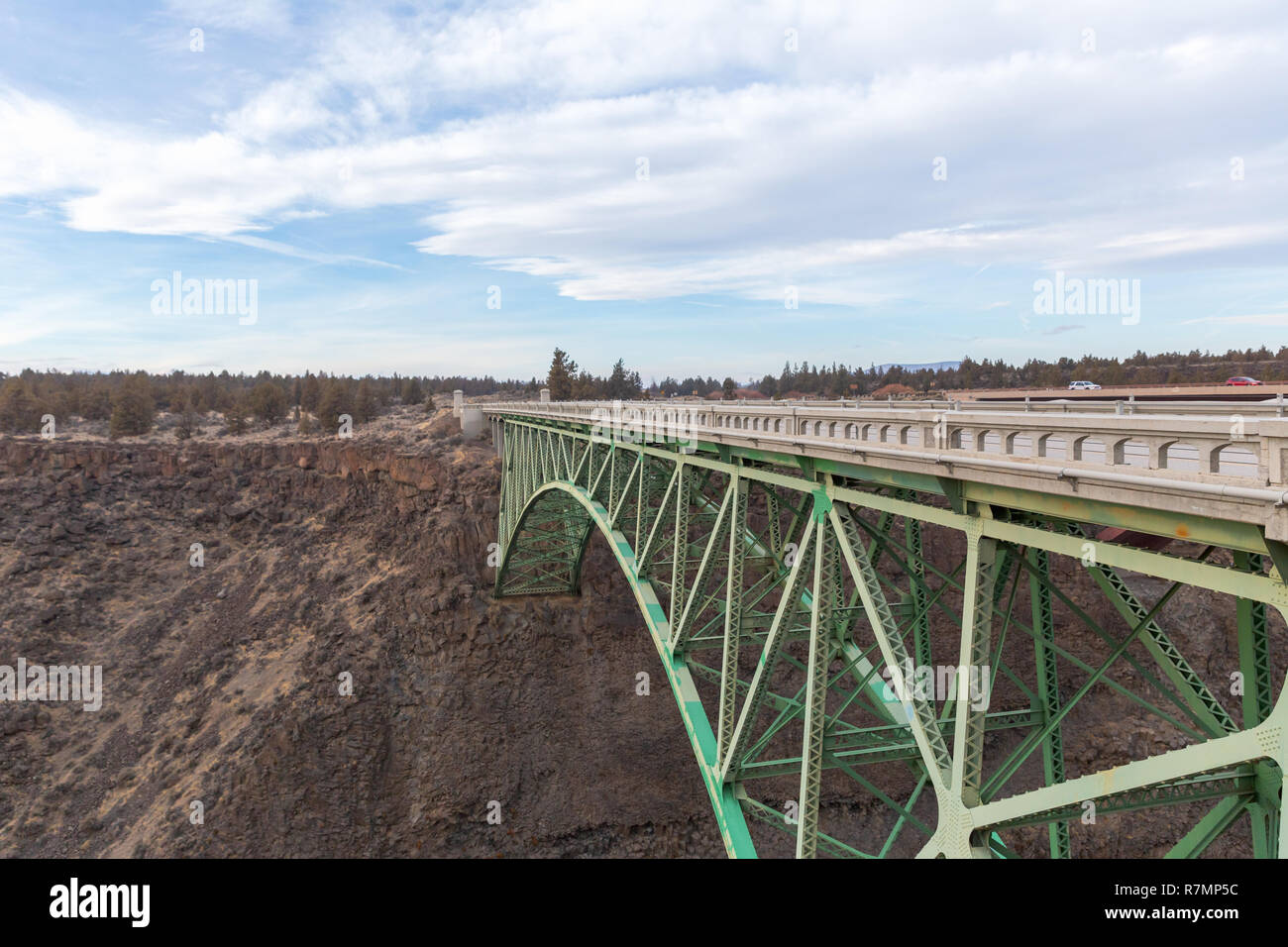 View of steel arch bridge as seen from Peter Skene Ogden Park near Terrebonne, Oregon Stock