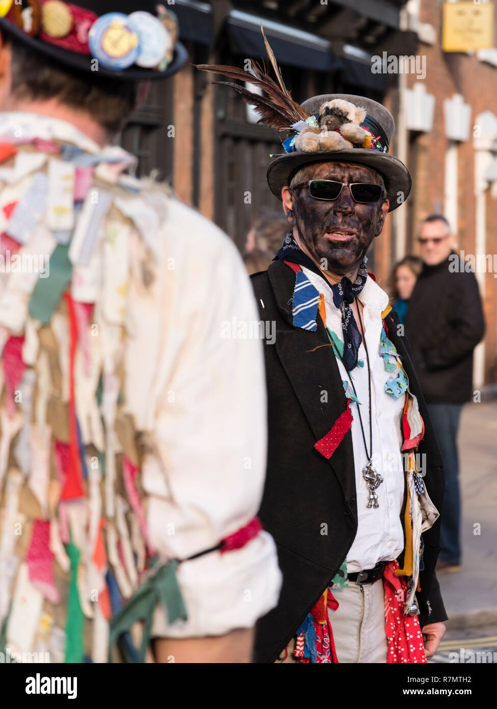 Black faced borders Morris dancers at the Victorian Christmas Market, Stratford upon Avon Stock Photo
