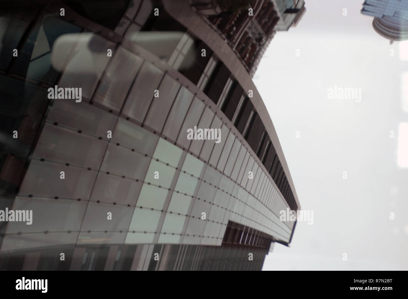Reflection of high rise office buildings in a car windscreen, Hong Kong, China. Stock Photo