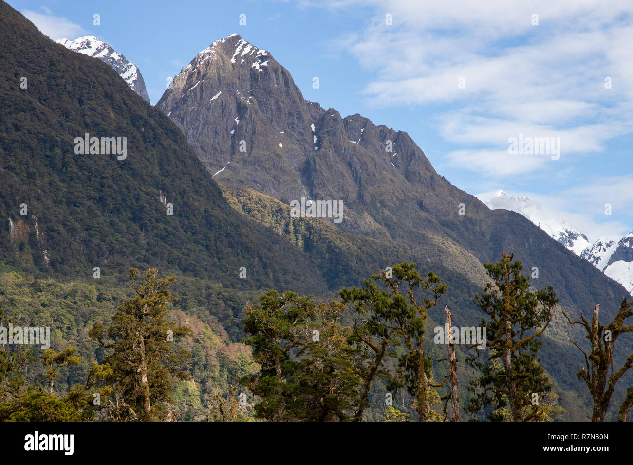 Steep Mountains in Fiordland, New Zealand Stock Photo