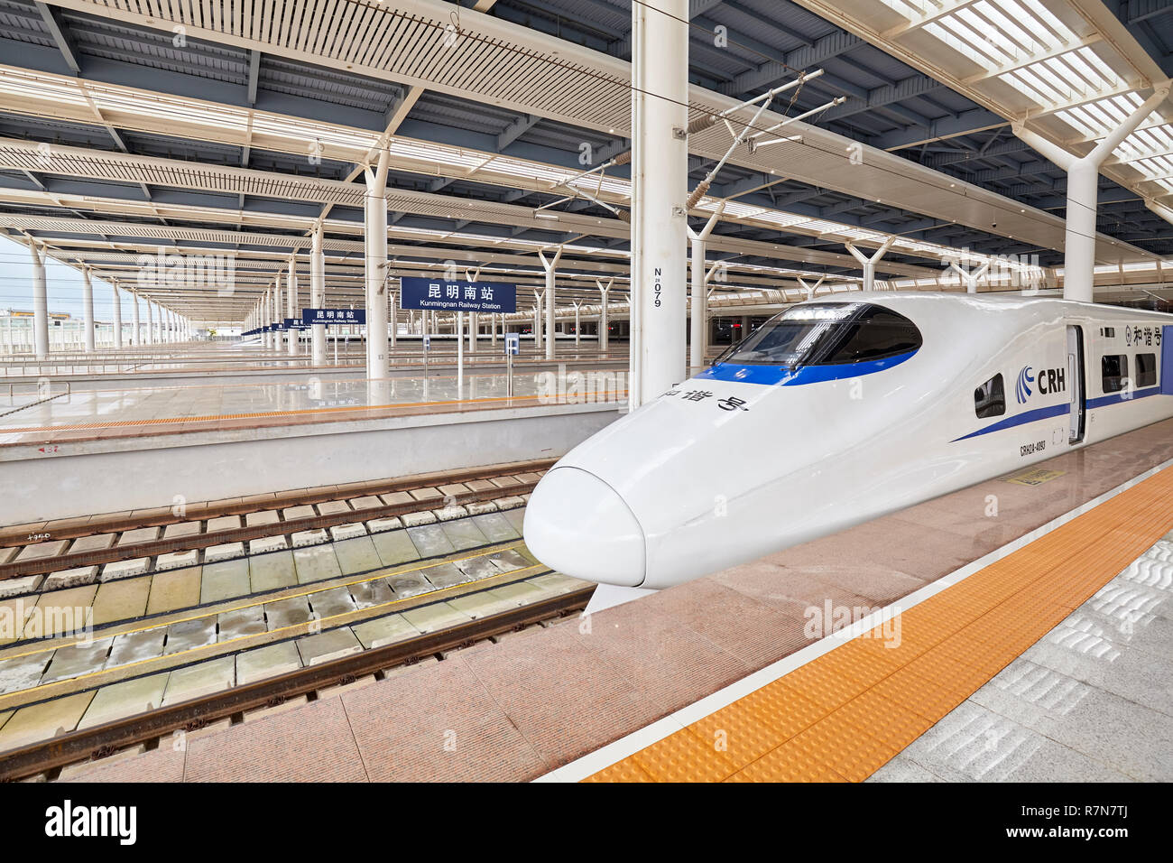 Kunming, China - September 21, 2017: High-speed train departs from the station. With railway network about 28 000 km long in 2018, High-speed rail (HS Stock Photo