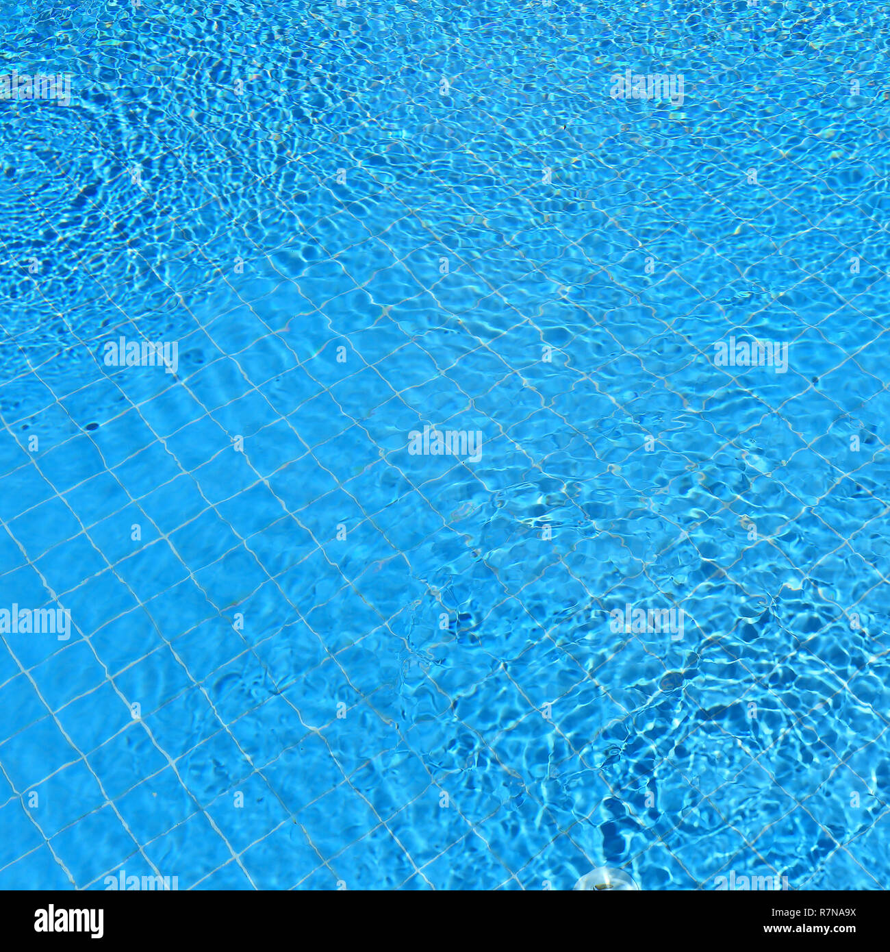 Abstract blue ripple water in swimming pool Stock Photo - Alamy