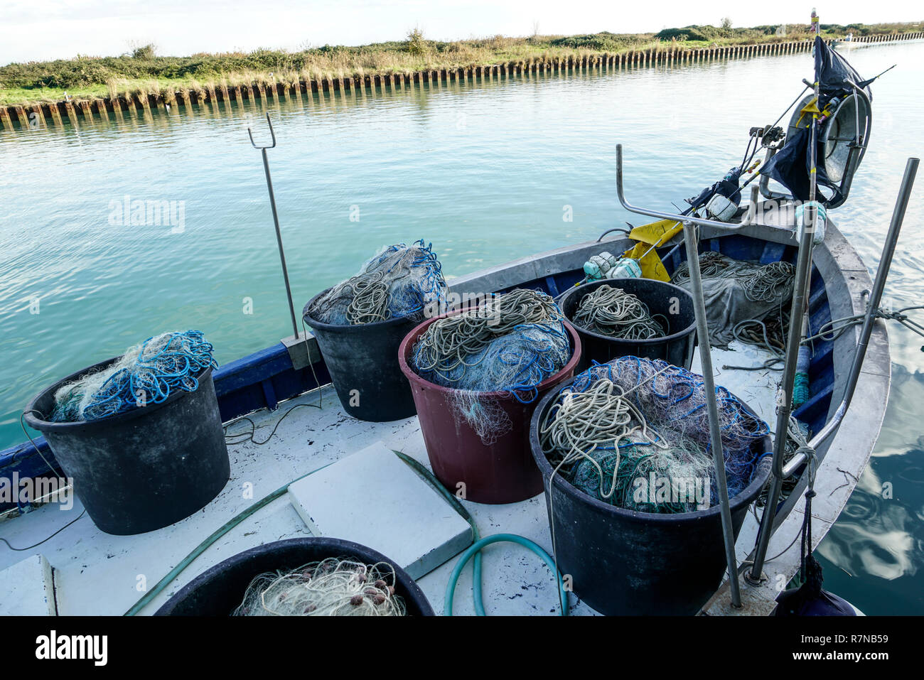 Industrial fishing boat with nets hi-res stock photography and