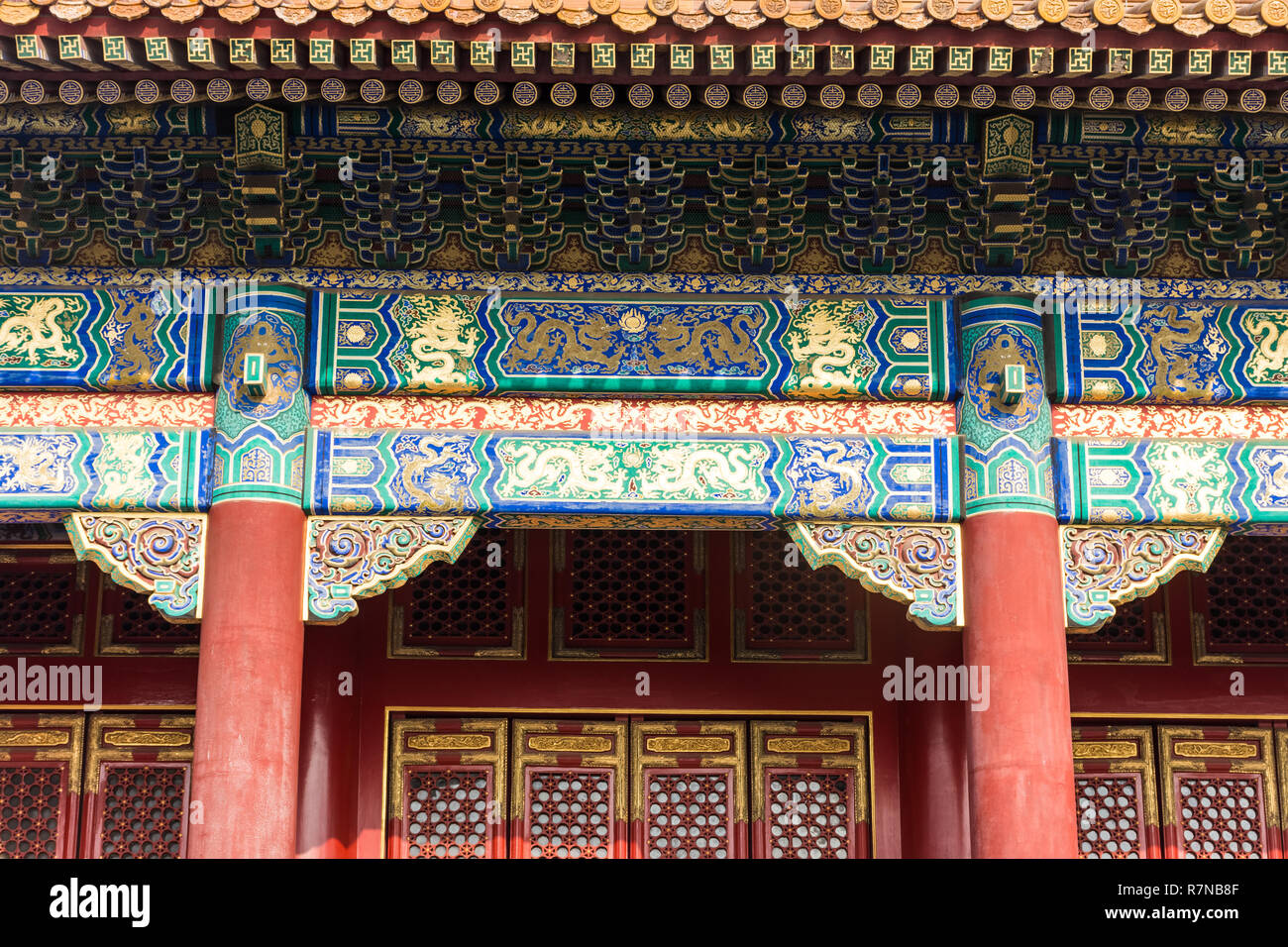 Architectural detail with a chinese golden dragon painted on the ...