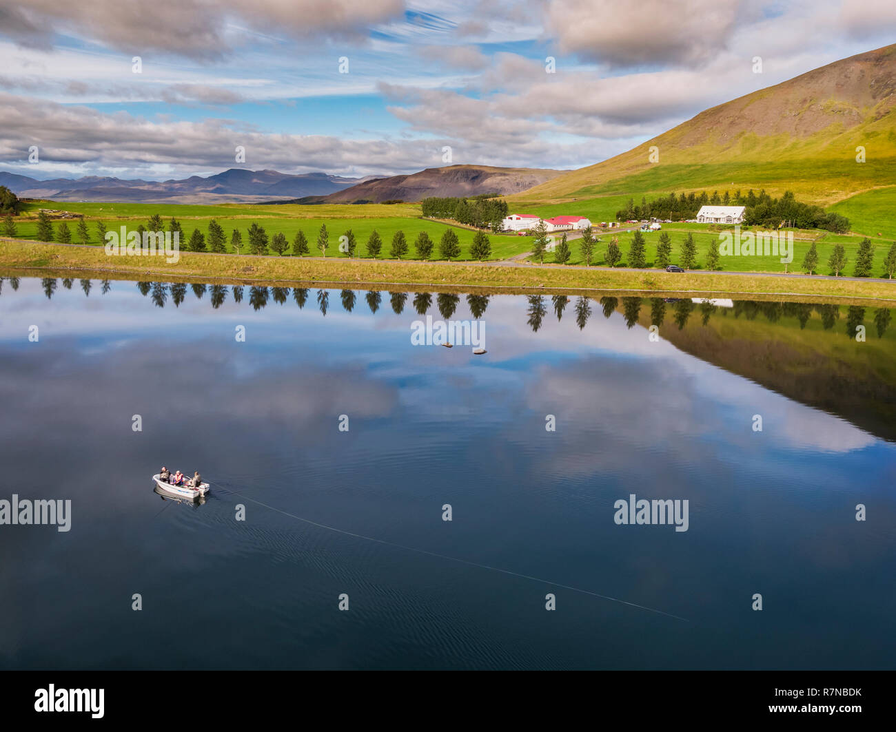 Boating on Lake Medalfellsvatn, Iceland. This image is shot using a drone. Stock Photo