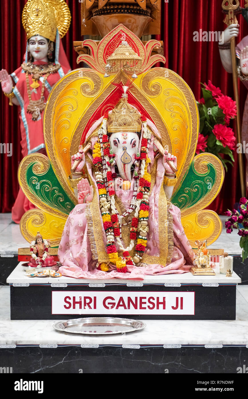 A statue of Shri Ganesh Ji at the alter inside the Geeta Temple in Corona, Queens, New York City Stock Photo