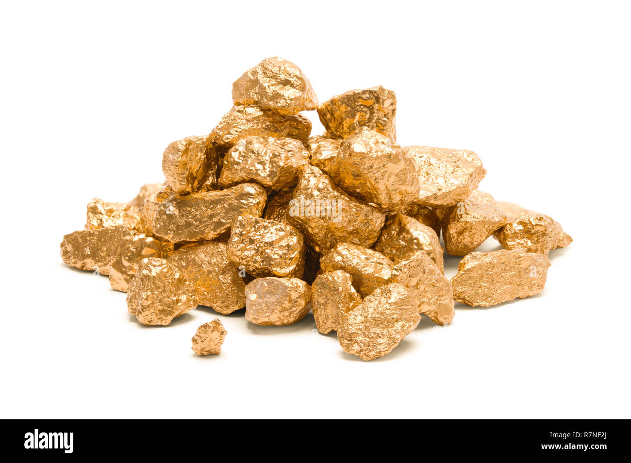 Pile of Gold Nuggets Isolated on White Background. Stock Photo