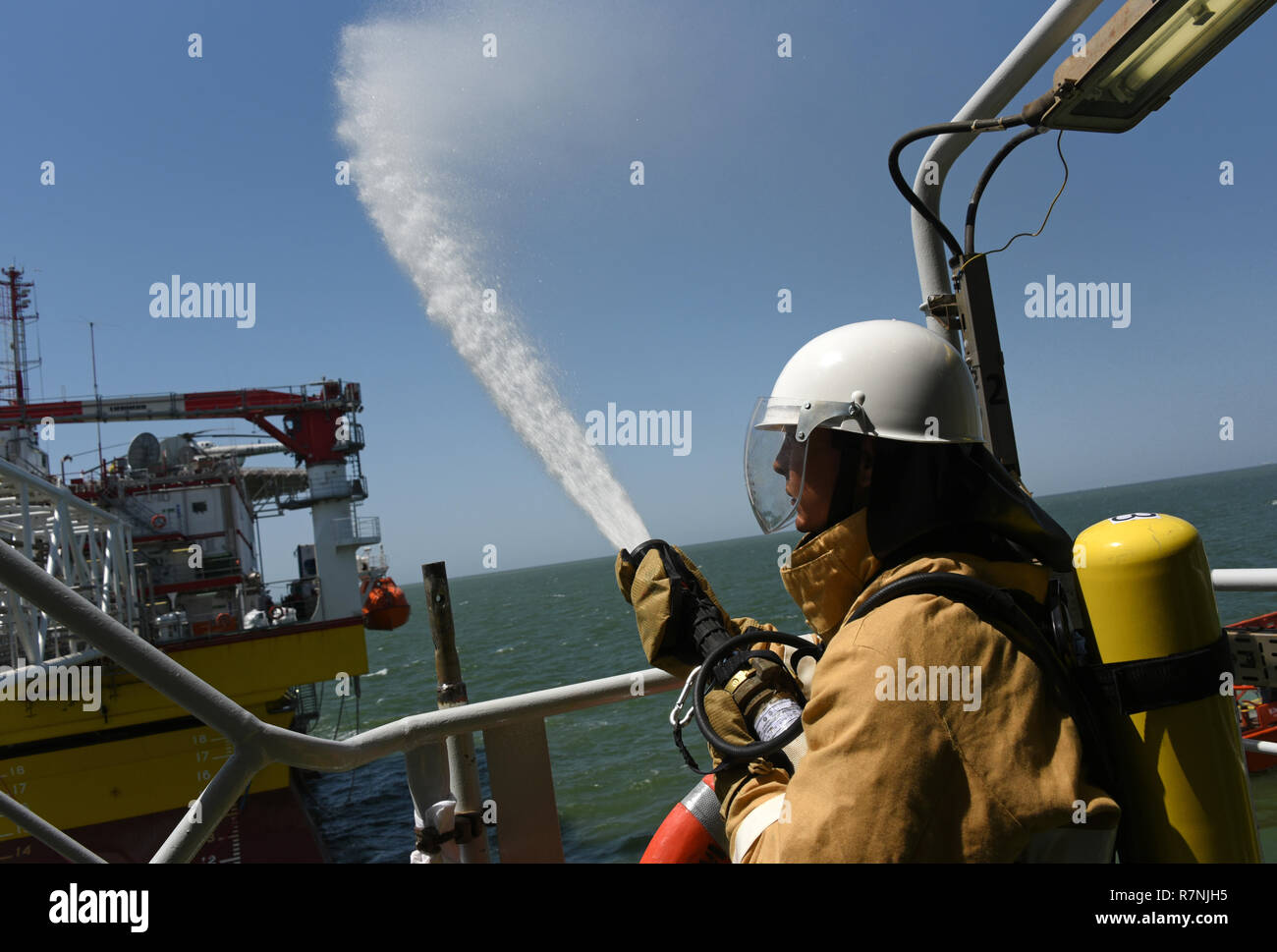 Fire fighting training exercises on the oil rig Lukoil Filanovsky at ...