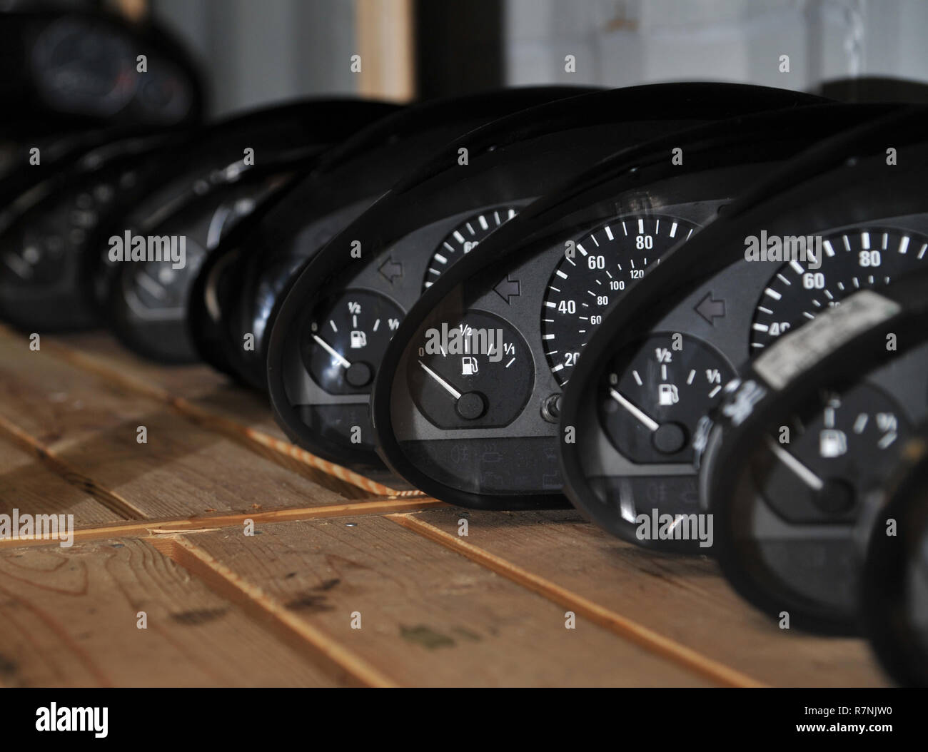 Car parts stacked in a car breakers yard-BMW speedo dials Stock Photo -  Alamy