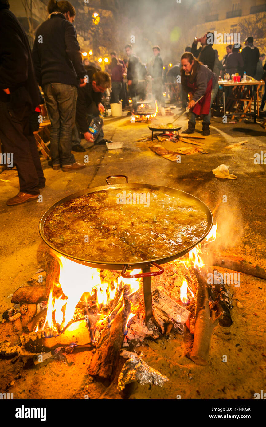Fallas festival. Cooking paella. Typical dish. Valencia. Valencian Community. Spain. Intangible Cultural Heritage of Humanity. UNESCO Stock Photo