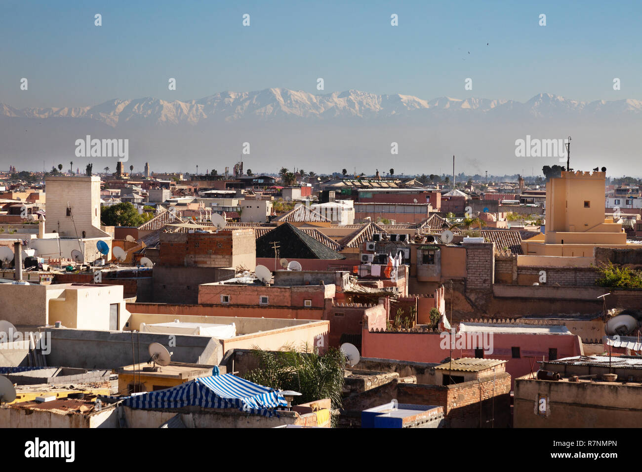 The Atlas Mountains above the Marrakech skyline, Marrakesh, Morocco North Africa Stock Photo