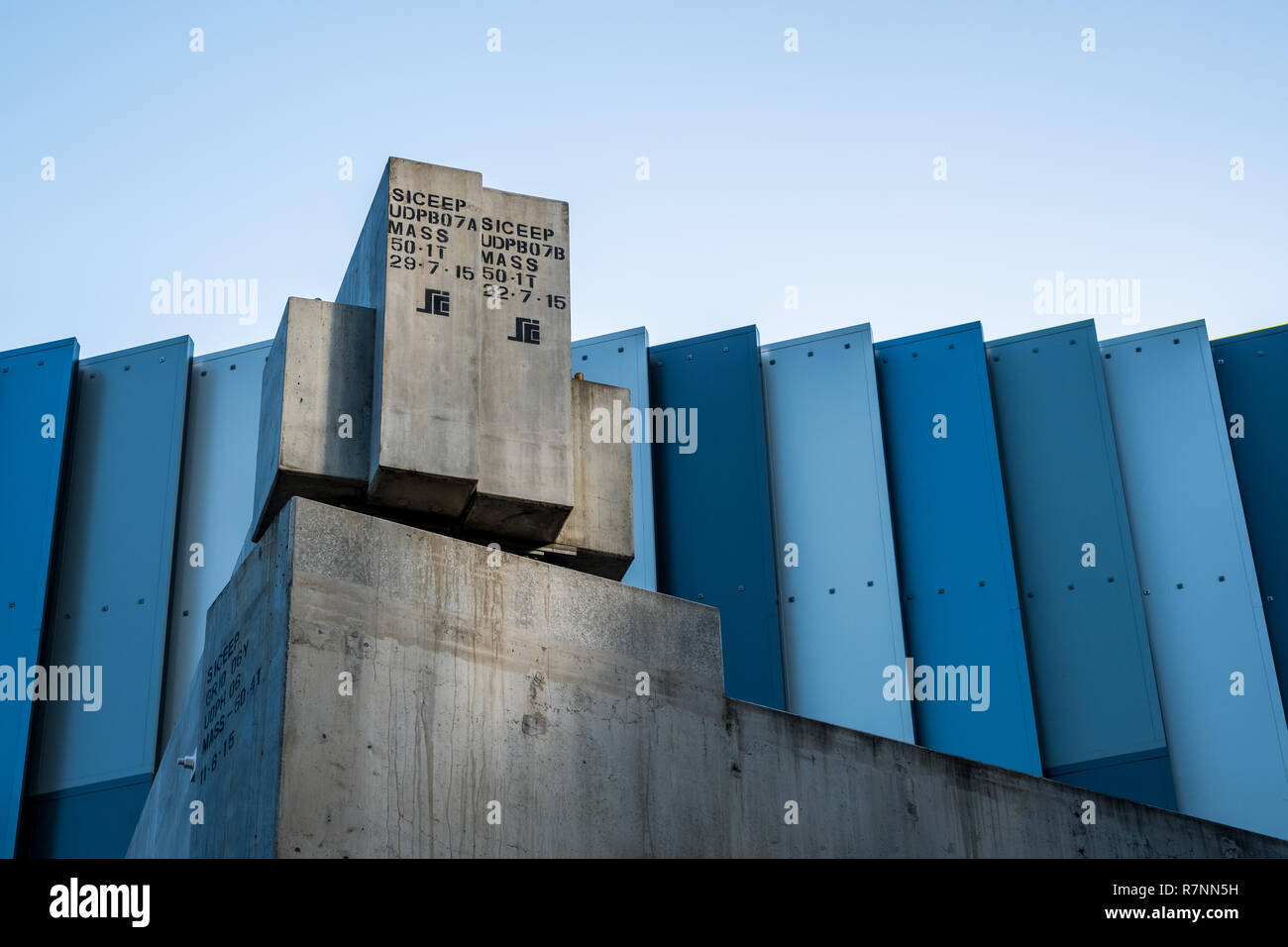 Concrete and blue building panels Stock Photo