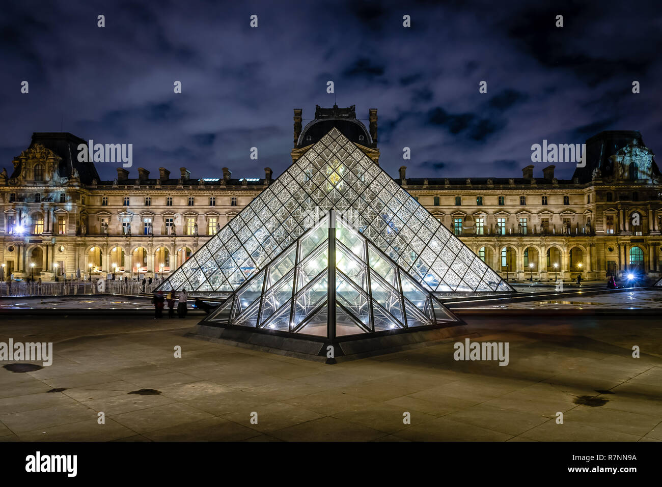 The Louvre Pyramid at night, Paris, France Stock Photo