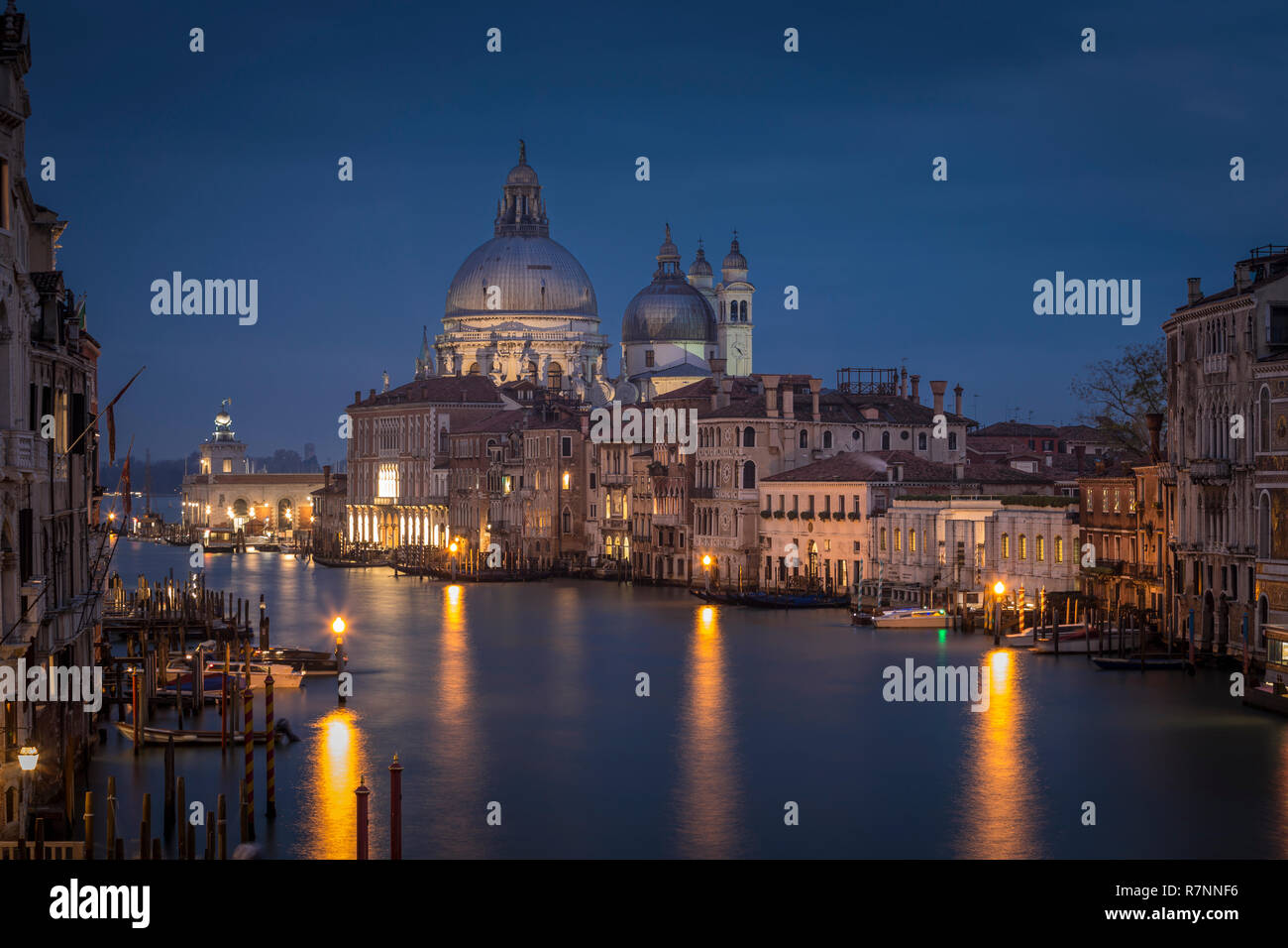 Grand Canal with Santa Maria della Salute church at night from Accademia bridge, Venice, Italy Stock Photo