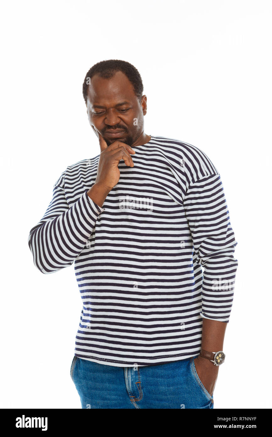 Cheerless unhappy man thinking about his life Stock Photo