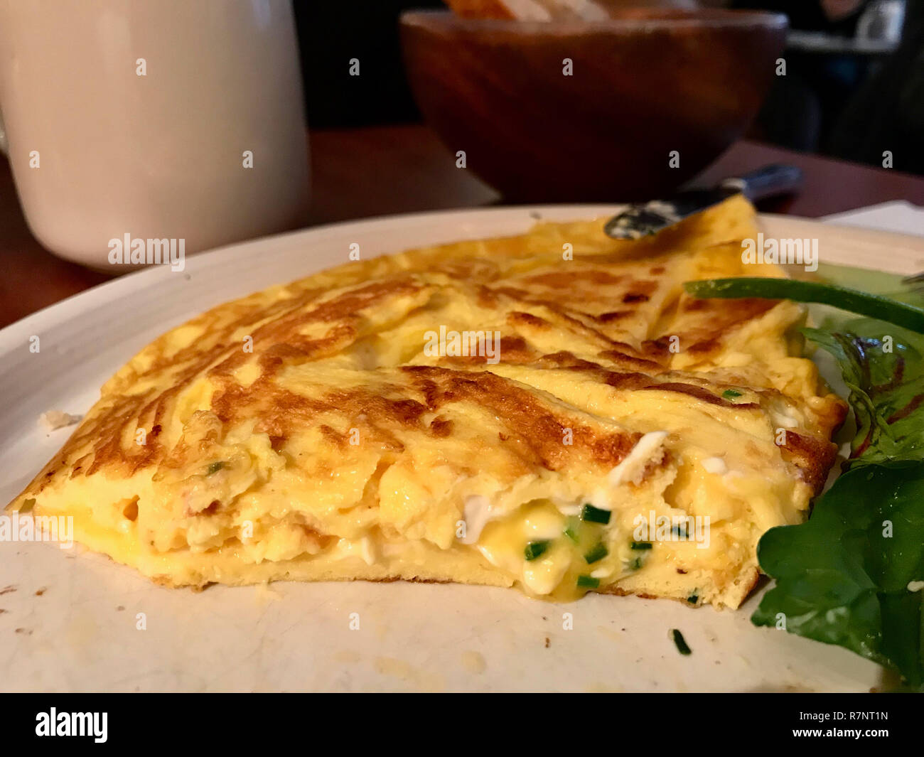 Omelette with Cream Cheese and Chives served at Restaurant. Organic