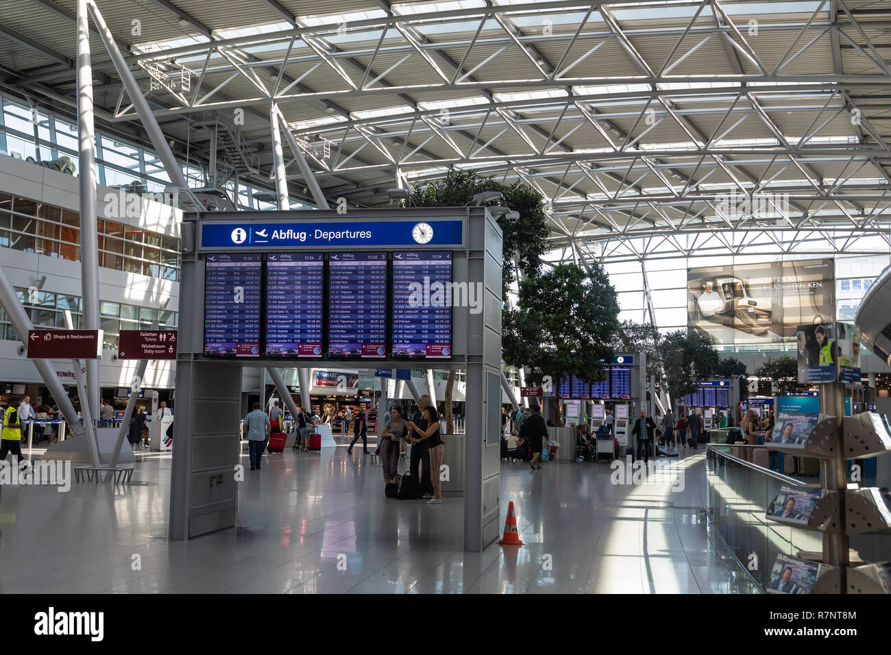 Dusseldorf, Germany - July 3, 2018: Hall of a departure of the airport  Dusseldorf International. Dusseldorf Airport located approximately 7  kilometres Stock Photo - Alamy