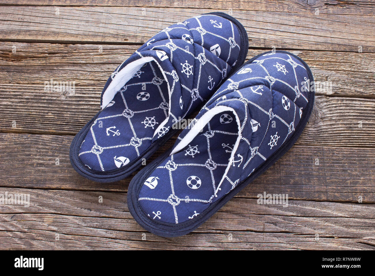 House slippers on old wooden floor Stock Photo
