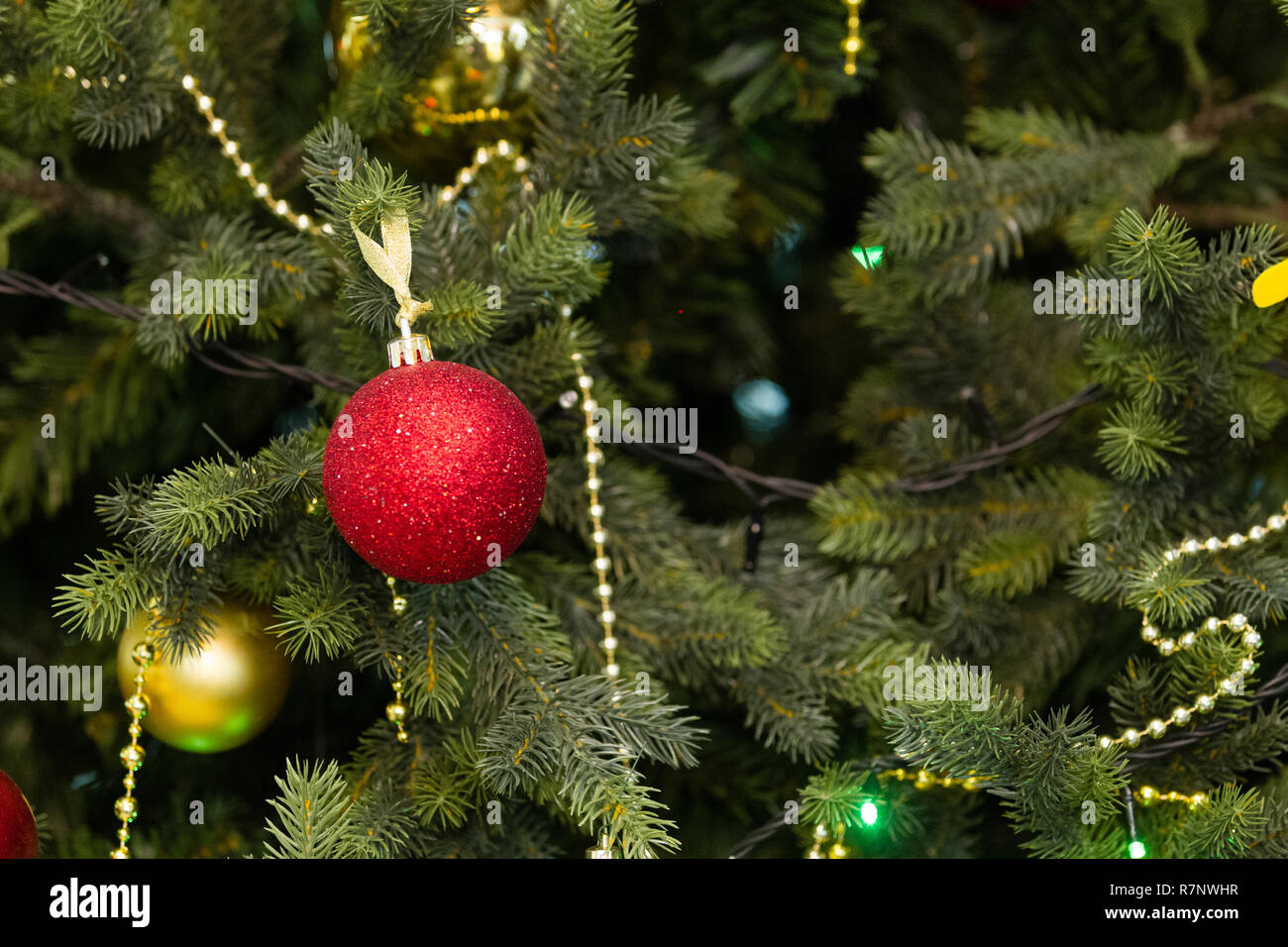 New Year. Celebration. Toys hang on the Christmas tree, background ...