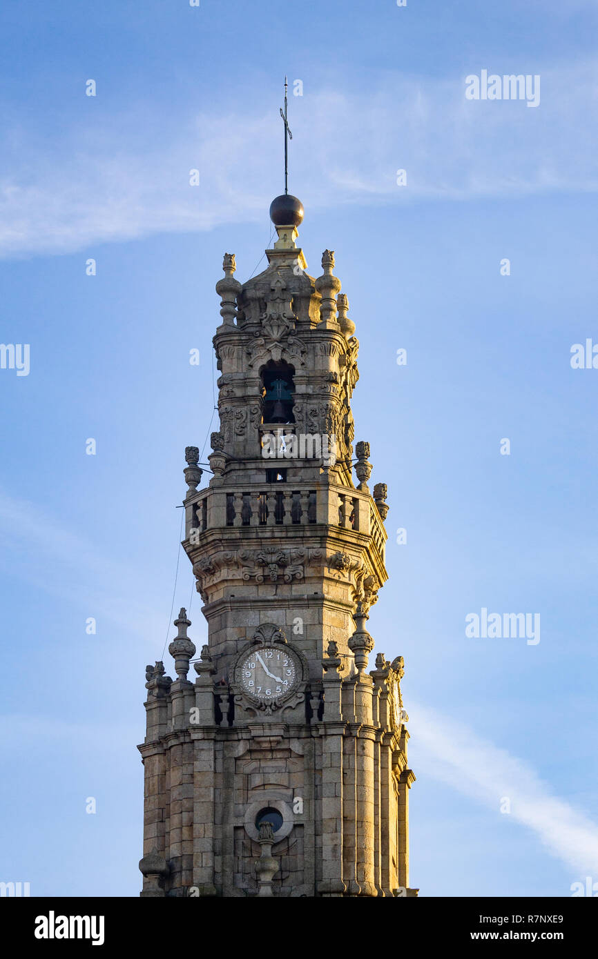 Top of the Torre dos Clerigos in Porto, Portugal against blue sky background. Copy space. Vertical Shot. Stock Photo