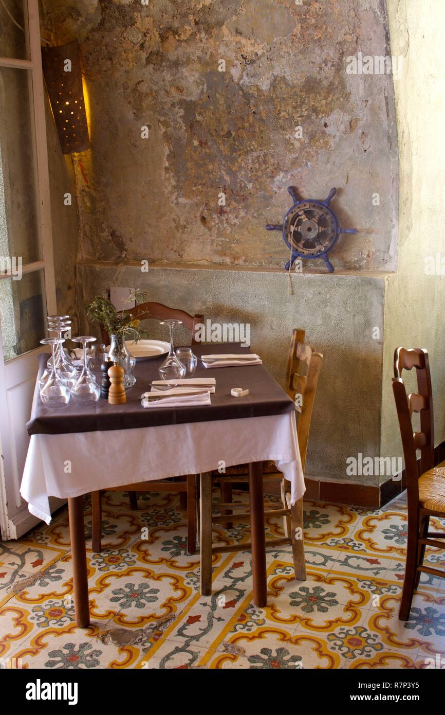 France, Haute Corse, Balagne, Calvi, decoration of the restaurant La table di a Loghia Stock Photo