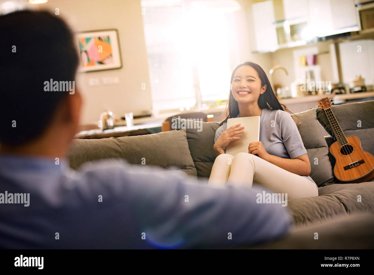 Picture of Romantic couples in the living room Stock Photo - Alamy