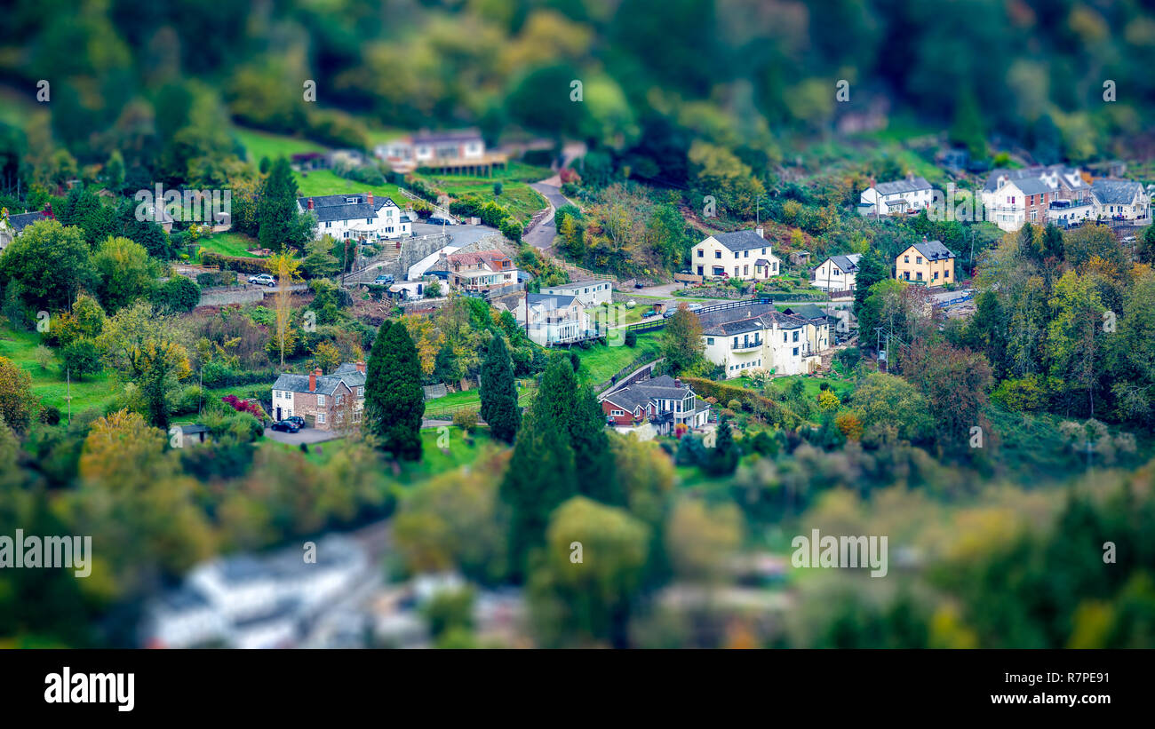 Tilt shift, miniature scene of toy town countryside houses in forest of dean Stock Photo