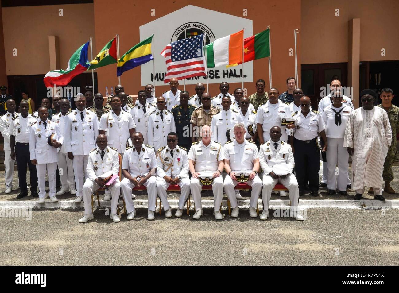 DOUALA, Cameroon (March 23, 2017) Participants in exercise Obangame Express 2017 pose for a photo in Douala, Cameroon. Obangame Express is sponsored by U.S. Africa Command and designed to improve regional cooperation, maritime domain awareness, information-sharing practices, and tactical interdiction expertise to enhance the collective capabilities of Gulf of Guinea and West African nations to counter sea-based illicit activity. Stock Photo