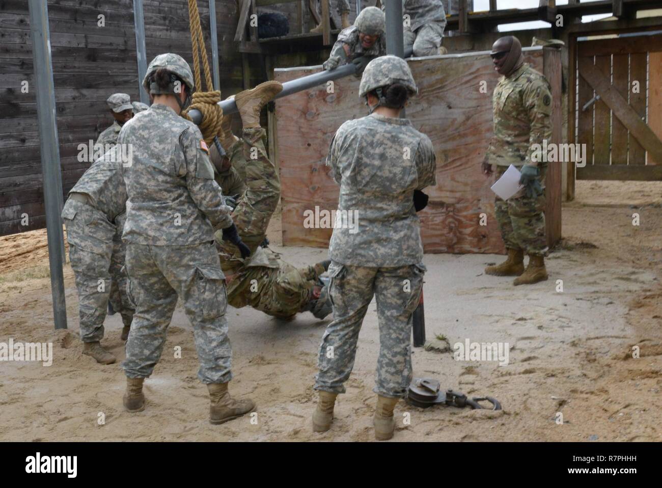 U.S. Soldiers, assigned to Public Health Command Europe, work together  during a team-building event at the 7th Army Training Command's Grafenwoehr  training area Germany, Mar. 20, 2017. The team-building exercises, which  included